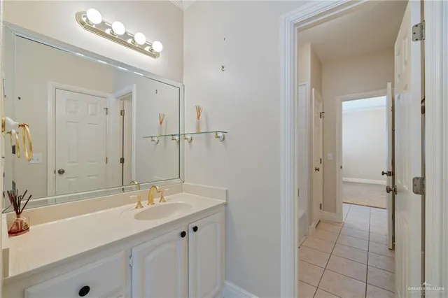 a bathroom with a sink double vanity and a mirror