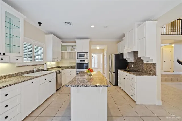 a large kitchen with cabinets