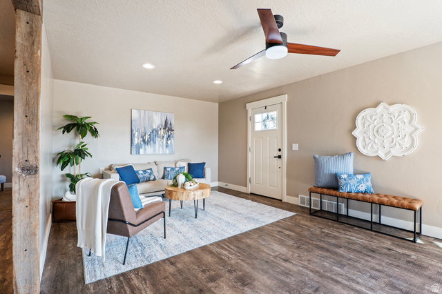 115 East 1600th Street North Santaquin, UT 84655 - Photo 20 of 52 Spacious living area featuring wood-finish flooring, recessed lighting, and a modern ceiling fan