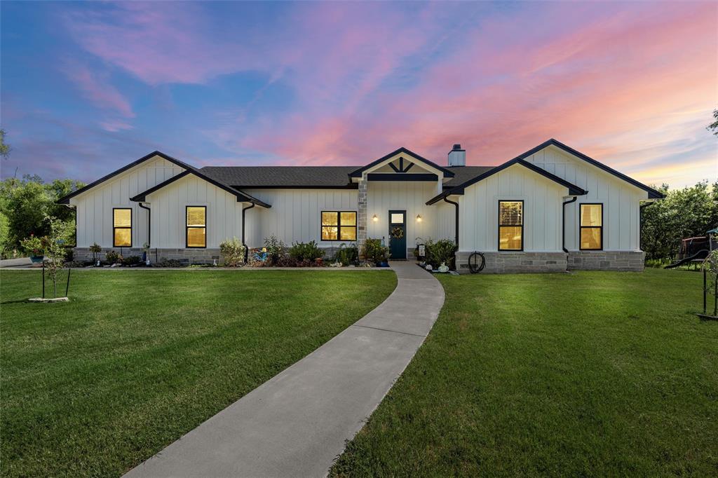 370 Rio Bonito Drive Robinson, TX 76706 - Photo 1 of 39 a front view of a house with a garden and yard