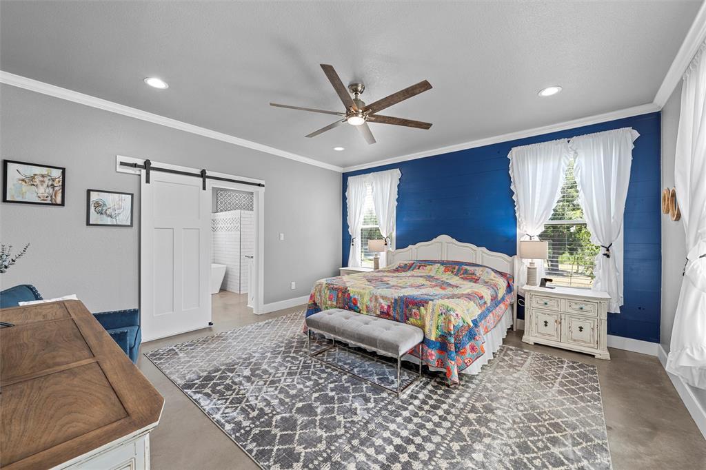 370 Rio Bonito Drive Robinson, TX 76706 - Photo 14 of 39 a bedroom with a bed and a window