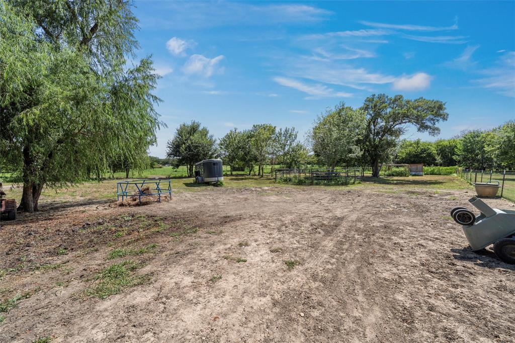 370 Rio Bonito Drive Robinson, TX 76706 - Photo 37 of 39 a view of outdoor space with deck and trees