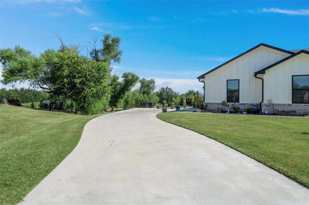 370 Rio Bonito Drive Robinson, TX 76706 - Photo 38 of 39 a view of a house with a yard
