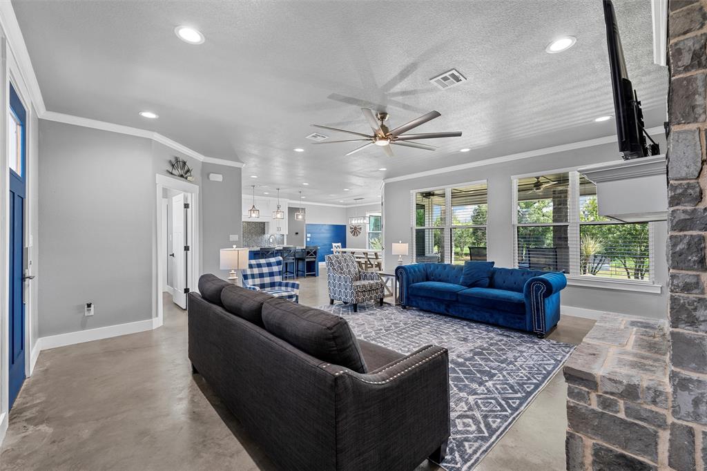 370 Rio Bonito Drive Robinson, TX 76706 - Photo 7 of 39 a living room with furniture and a large window