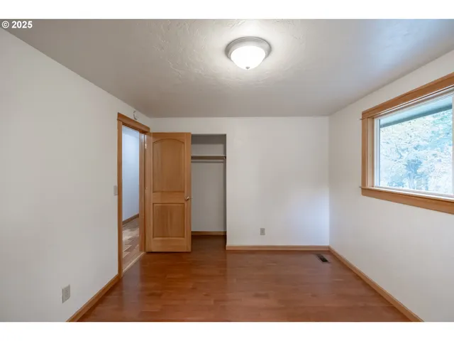 view of an empty room and window