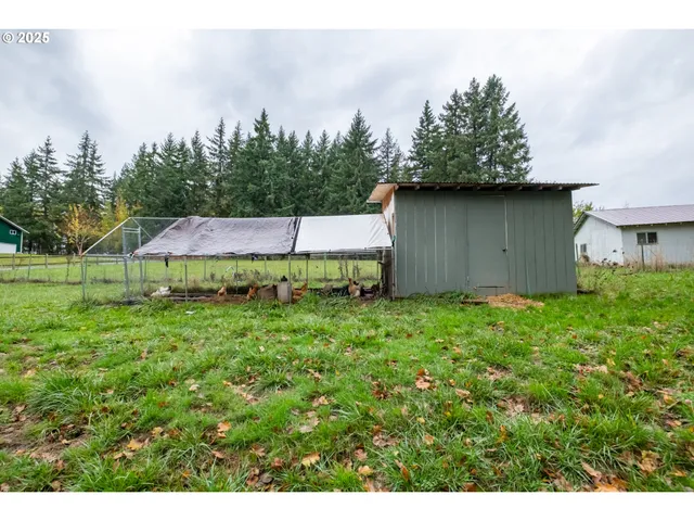 a backyard of a house with lots of green space