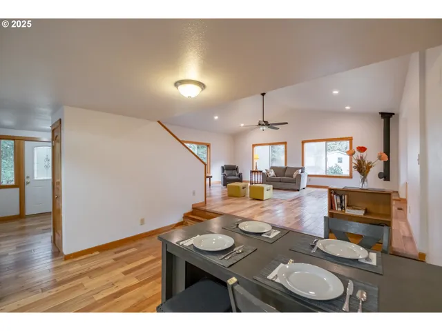 a view of kitchen and dining room with wooden floor