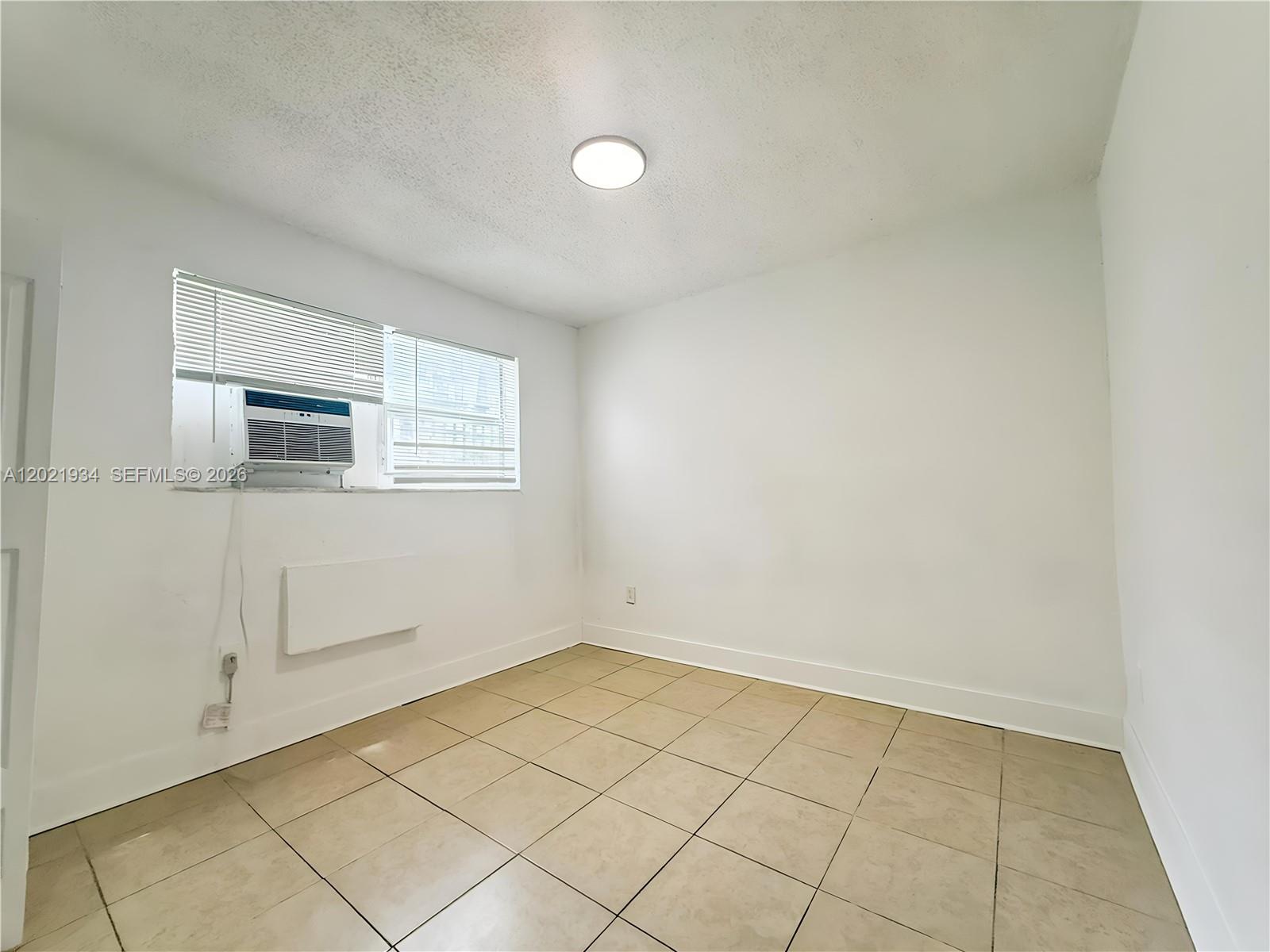 220 Northwest 11th Terrace, Unit 2 Miami, FL 33136 - Photo 9 of 9 a view of an empty room