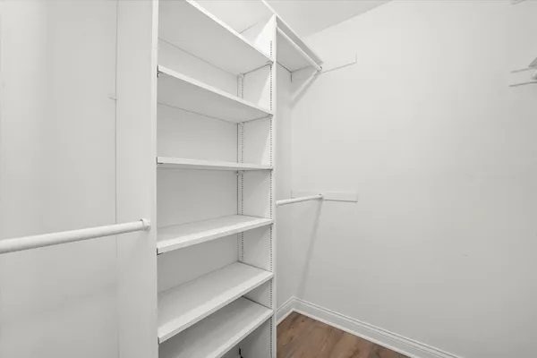 a view of an empty walk in closet