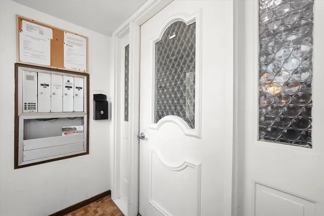 a bathroom with a shower and a window
