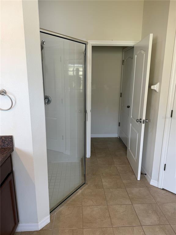 2862 Running Brook Circle Kissimmee, FL 34744 - Photo 14 of 24 a bathroom with a shower and a sink
