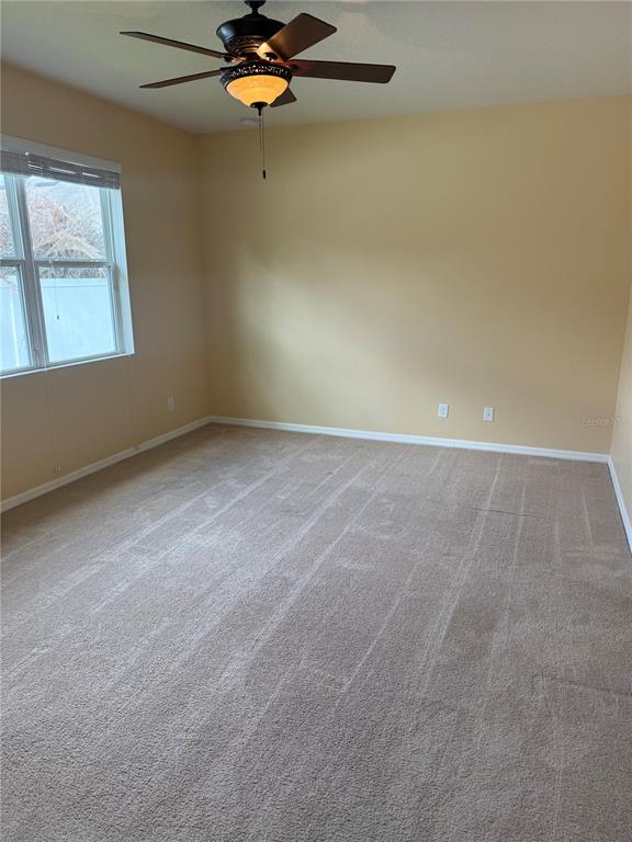 2862 Running Brook Circle Kissimmee, FL 34744 - Photo 17 of 24 an empty room with a window