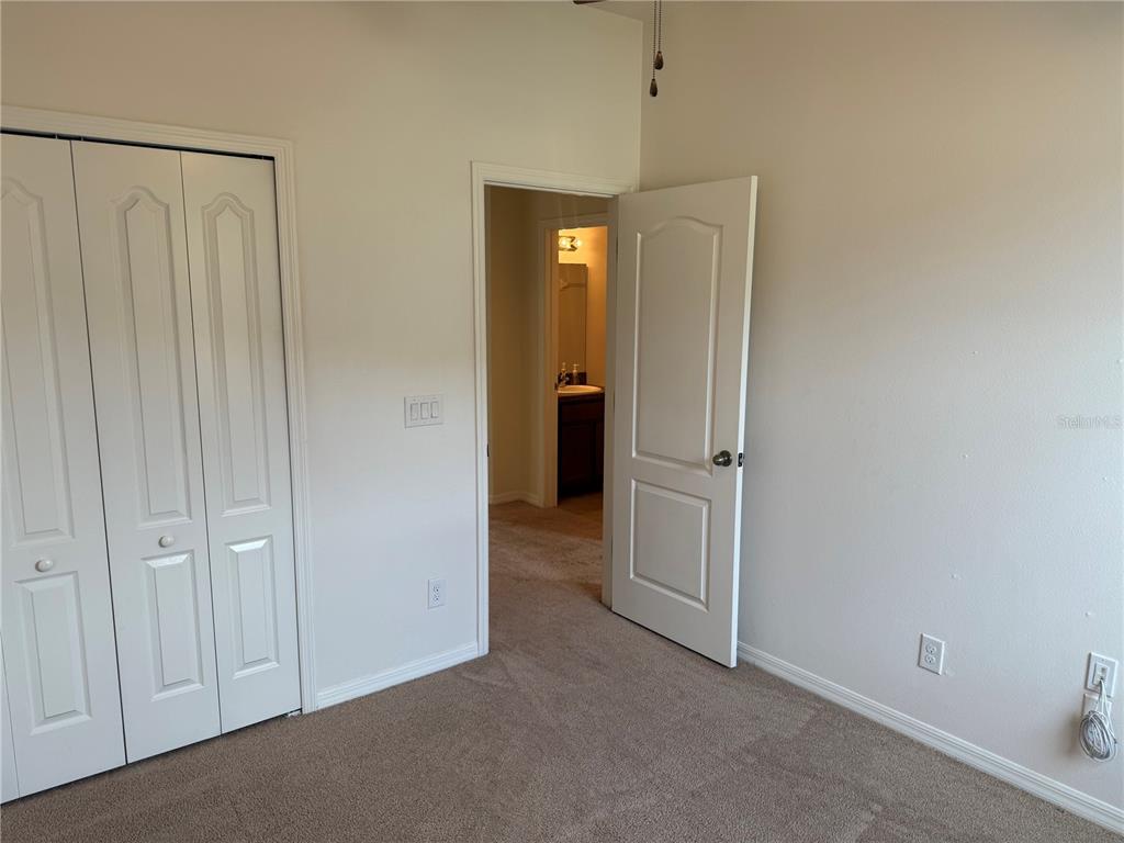 2862 Running Brook Circle Kissimmee, FL 34744 - Photo 21 of 24 a view of a hallway with closet area