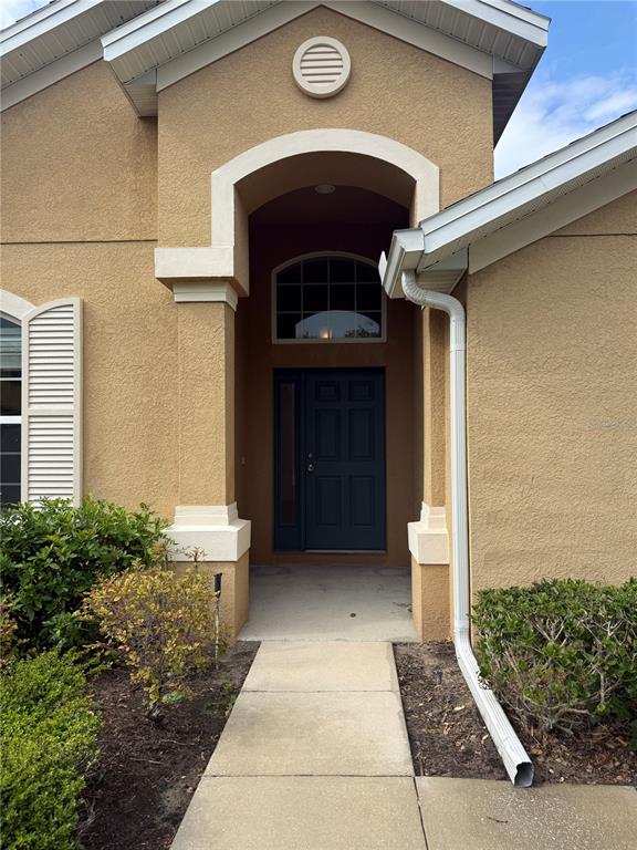 2862 Running Brook Circle Kissimmee, FL 34744 - Photo 5 of 24 a front view of a house with a yard