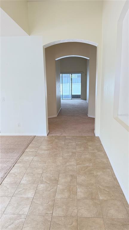 2862 Running Brook Circle Kissimmee, FL 34744 - Photo 6 of 24 a view of empty room with window