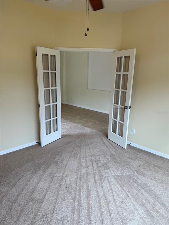 2862 Running Brook Circle Kissimmee, FL 34744 - Photo 10 of 24 an empty room with windows
