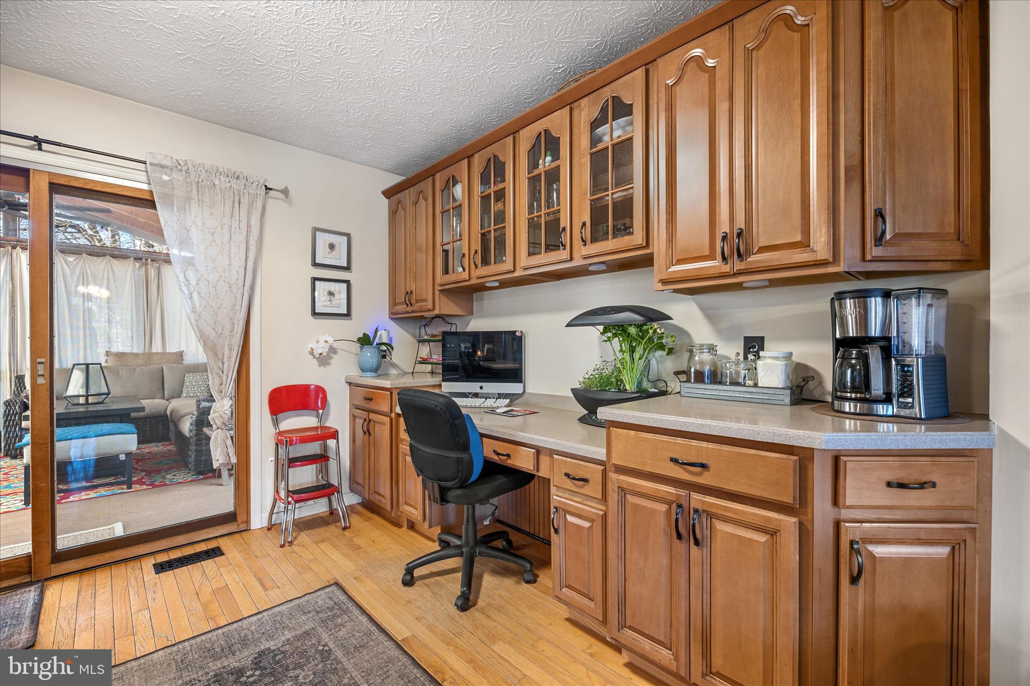 7914 Leeds Drive Pasadena, MD 21122 - Photo 11 of 49 a view of a kitchen with granite countertop a workspace