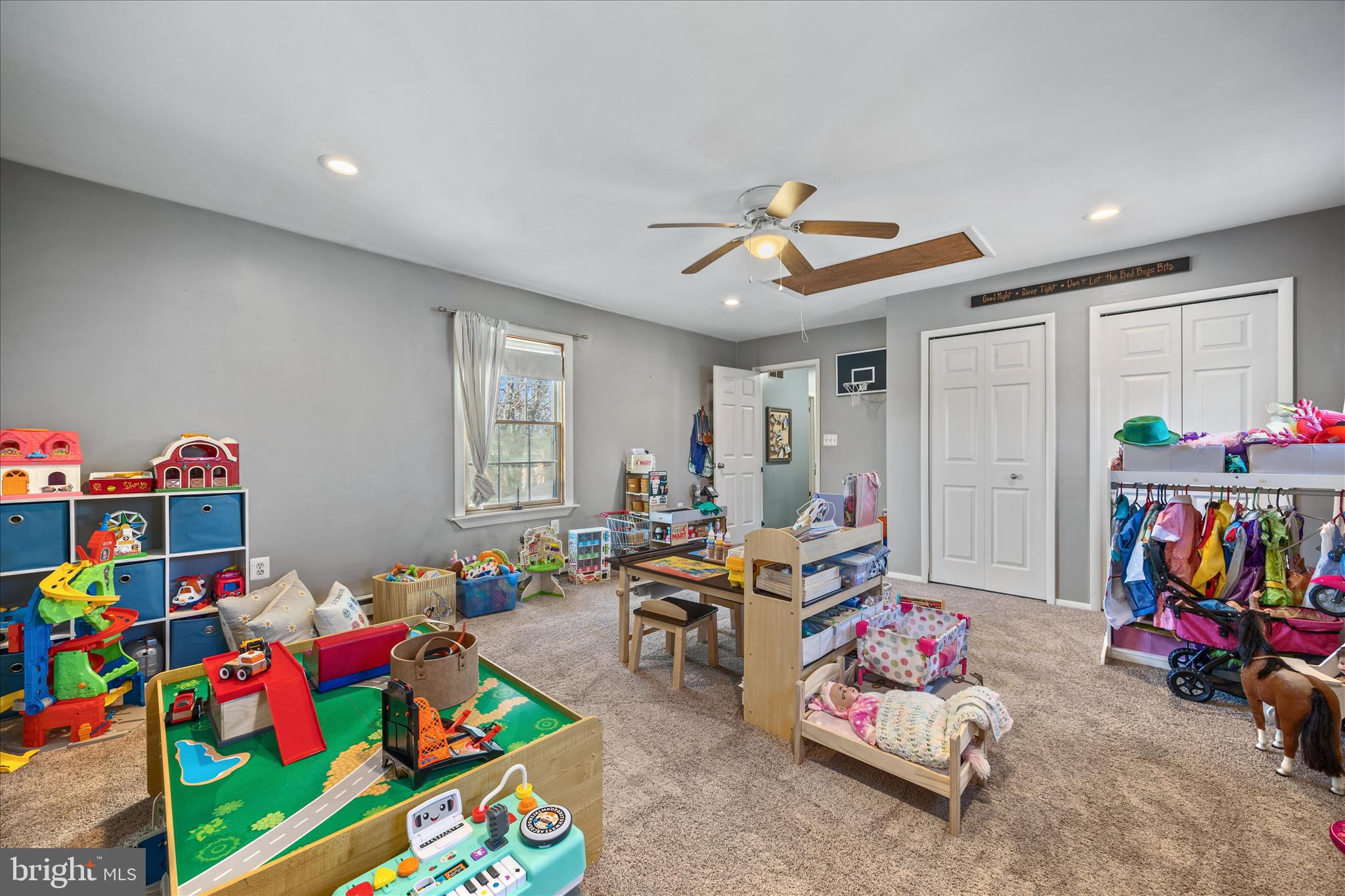 7914 Leeds Drive Pasadena, MD 21122 - Photo 17 of 49 a bed room with lots of baby toys