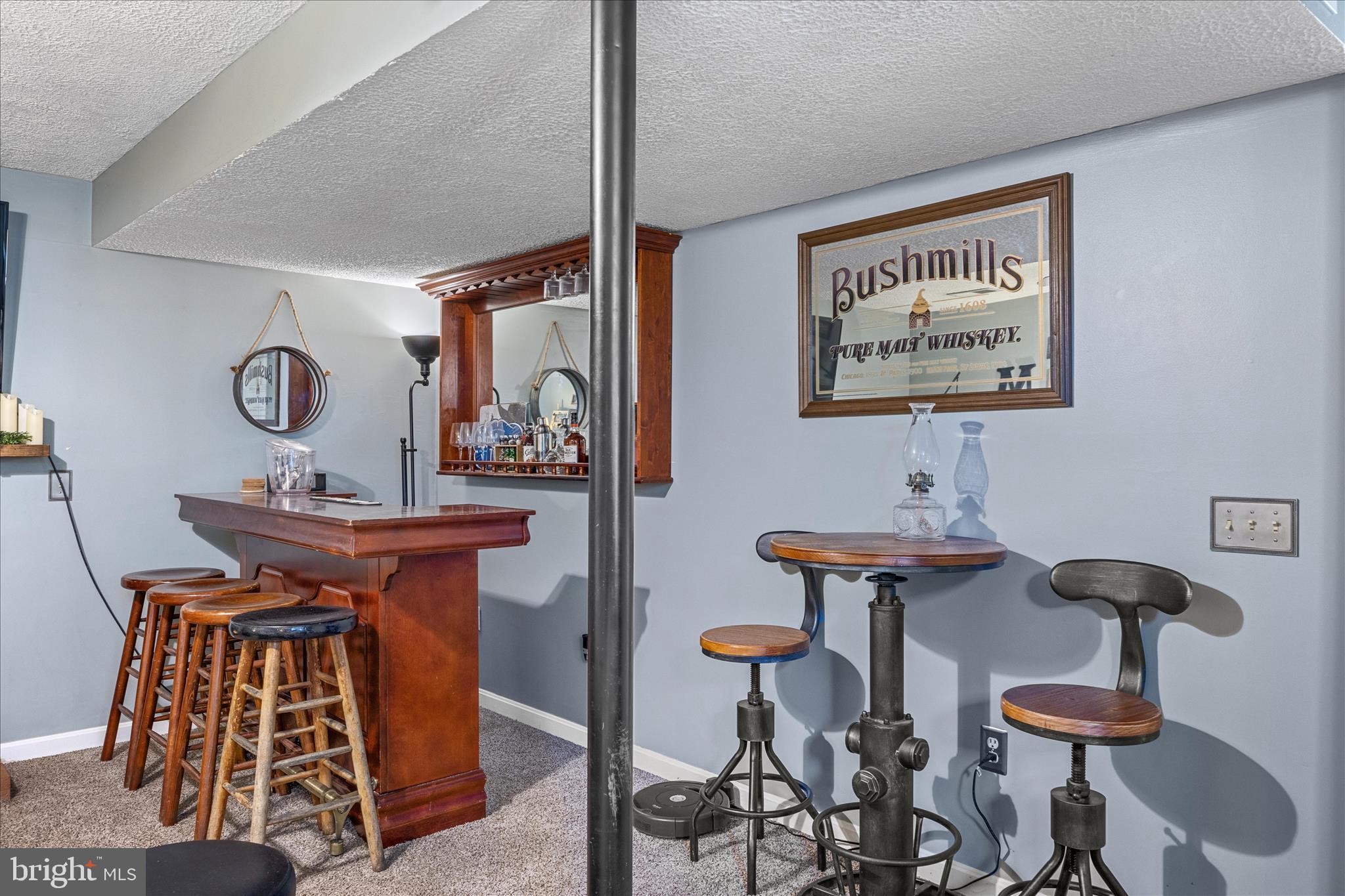 7914 Leeds Drive Pasadena, MD 21122 - Photo 33 of 49 a view of a room that has a table and chairs in it