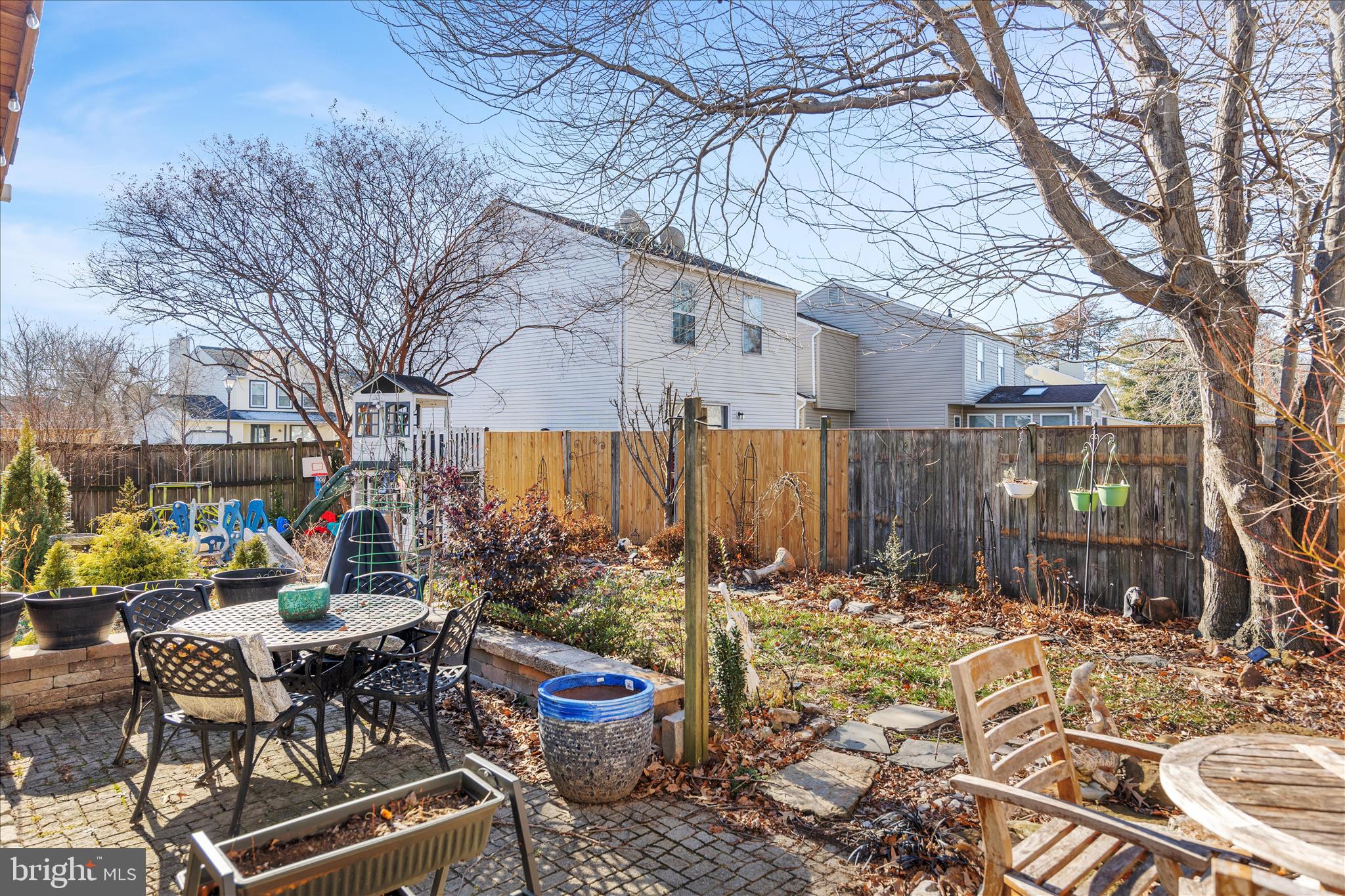 7914 Leeds Drive Pasadena, MD 21122 - Photo 38 of 49 a view of a chairs and table in backyard