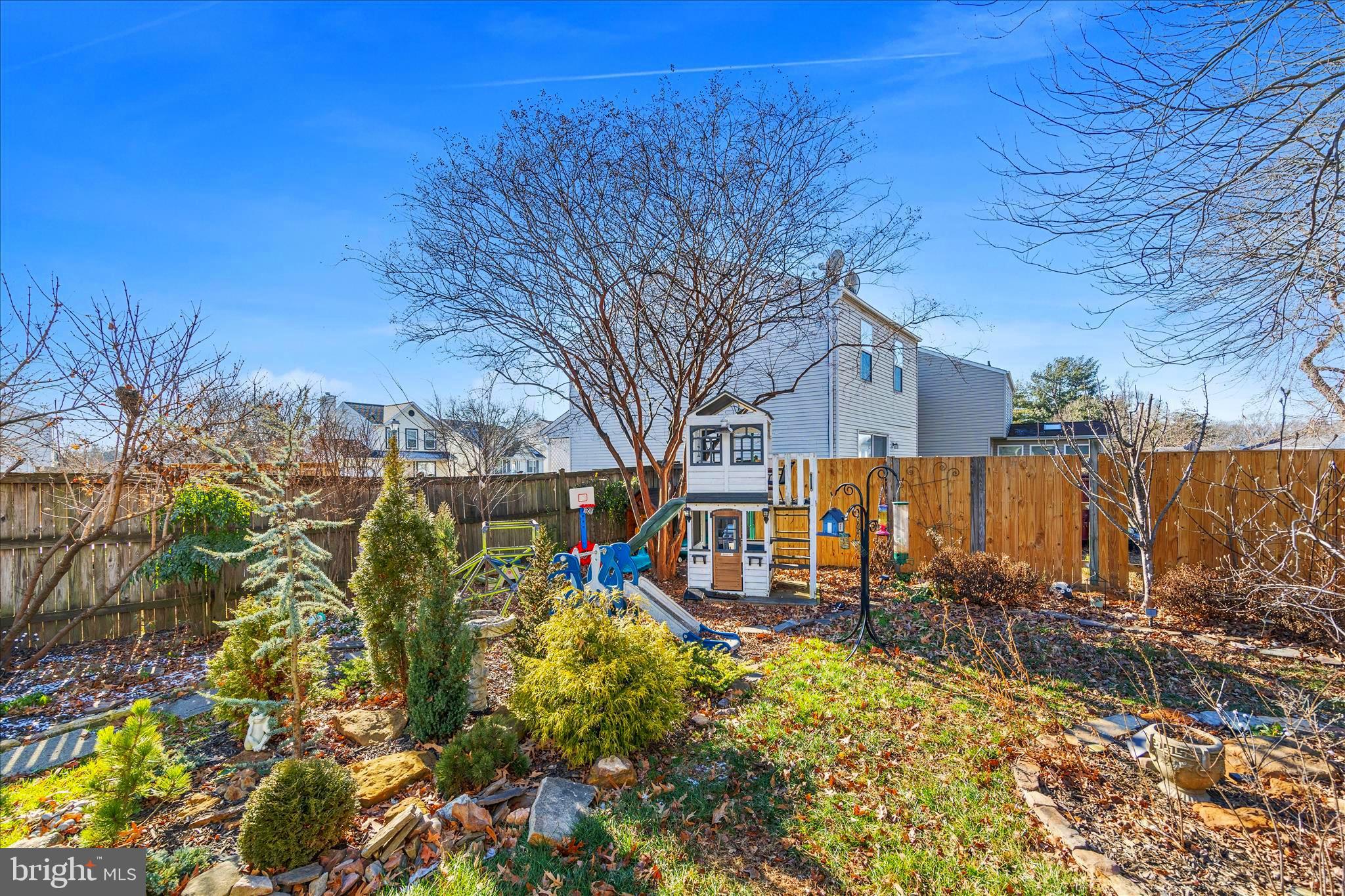 7914 Leeds Drive Pasadena, MD 21122 - Photo 40 of 49 a view of outdoor space with garden