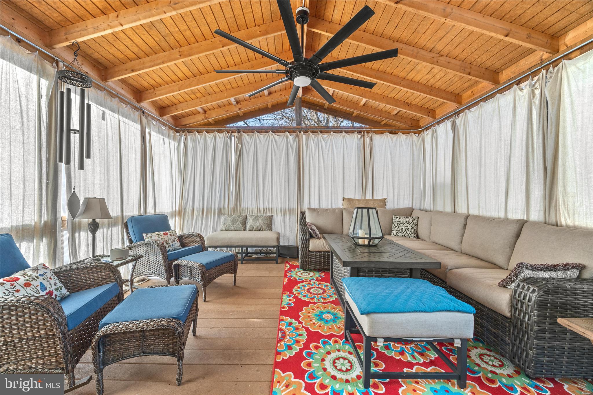 7914 Leeds Drive Pasadena, MD 21122 - Photo 8 of 49 a living room with furniture and a patio