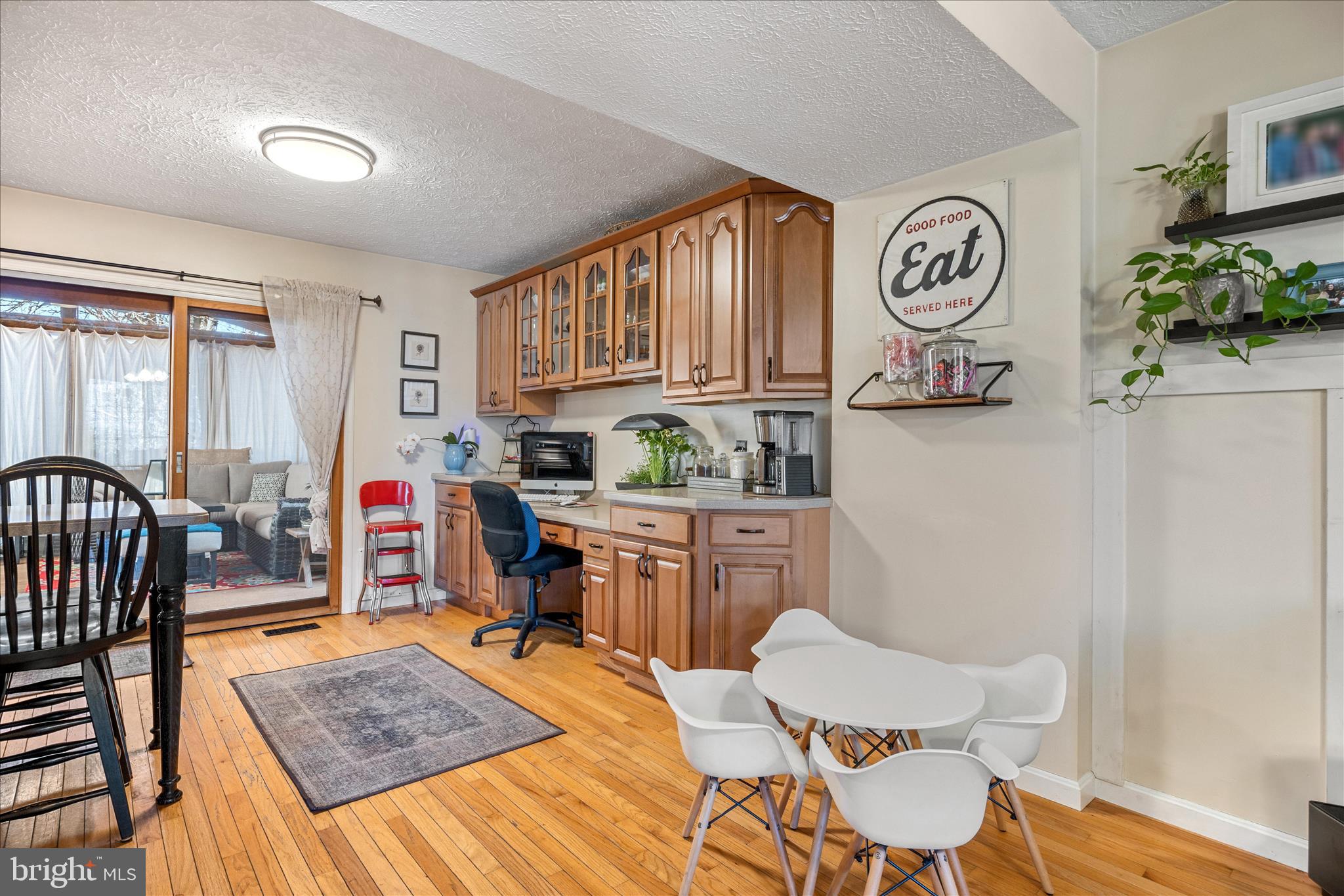 7914 Leeds Drive Pasadena, MD 21122 - Photo 10 of 49 a bed room with a bed and a table in it