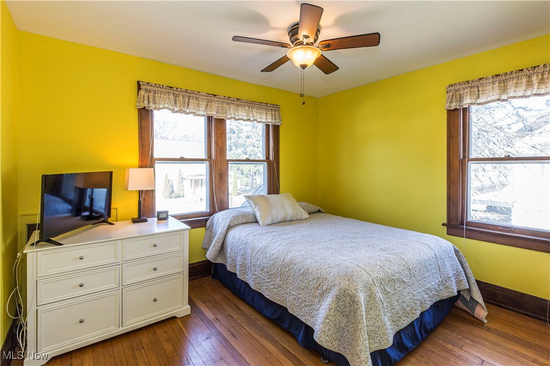 1577 Maple Road Cleveland Heights, OH 44121 - Photo 13 of 30 Bedroom with dark wood finished floors, ceiling fan