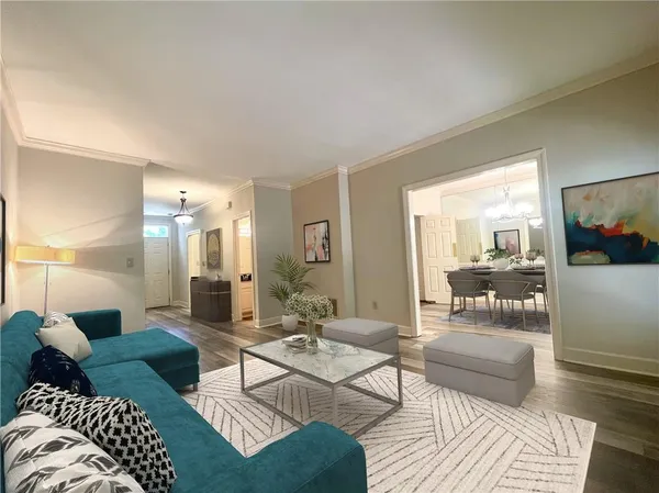 a living room with furniture and a couch