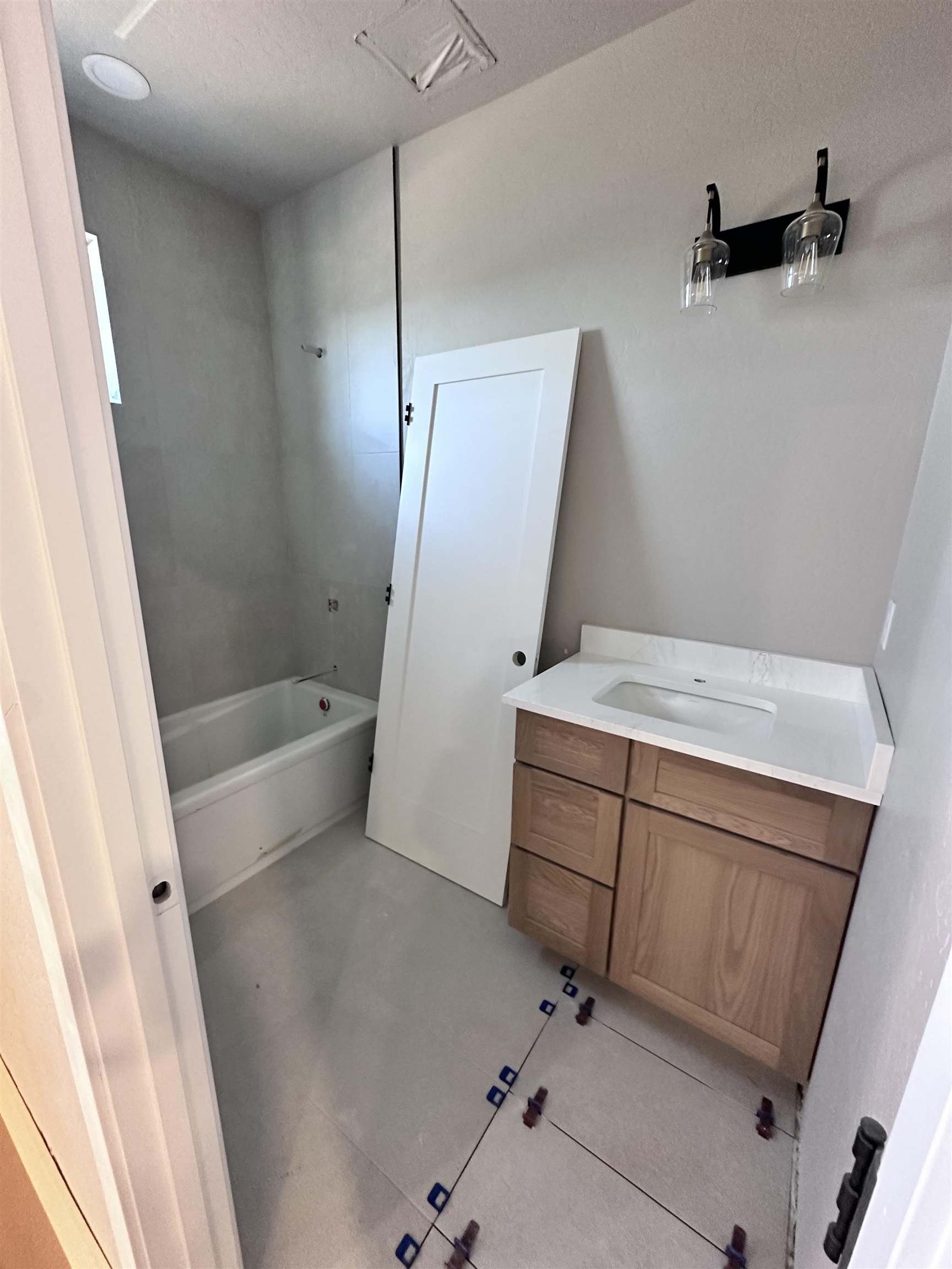 1924 K Road Fruita, CO 81521 - Photo 11 of 13 a bathroom with a sink a toilet and shower