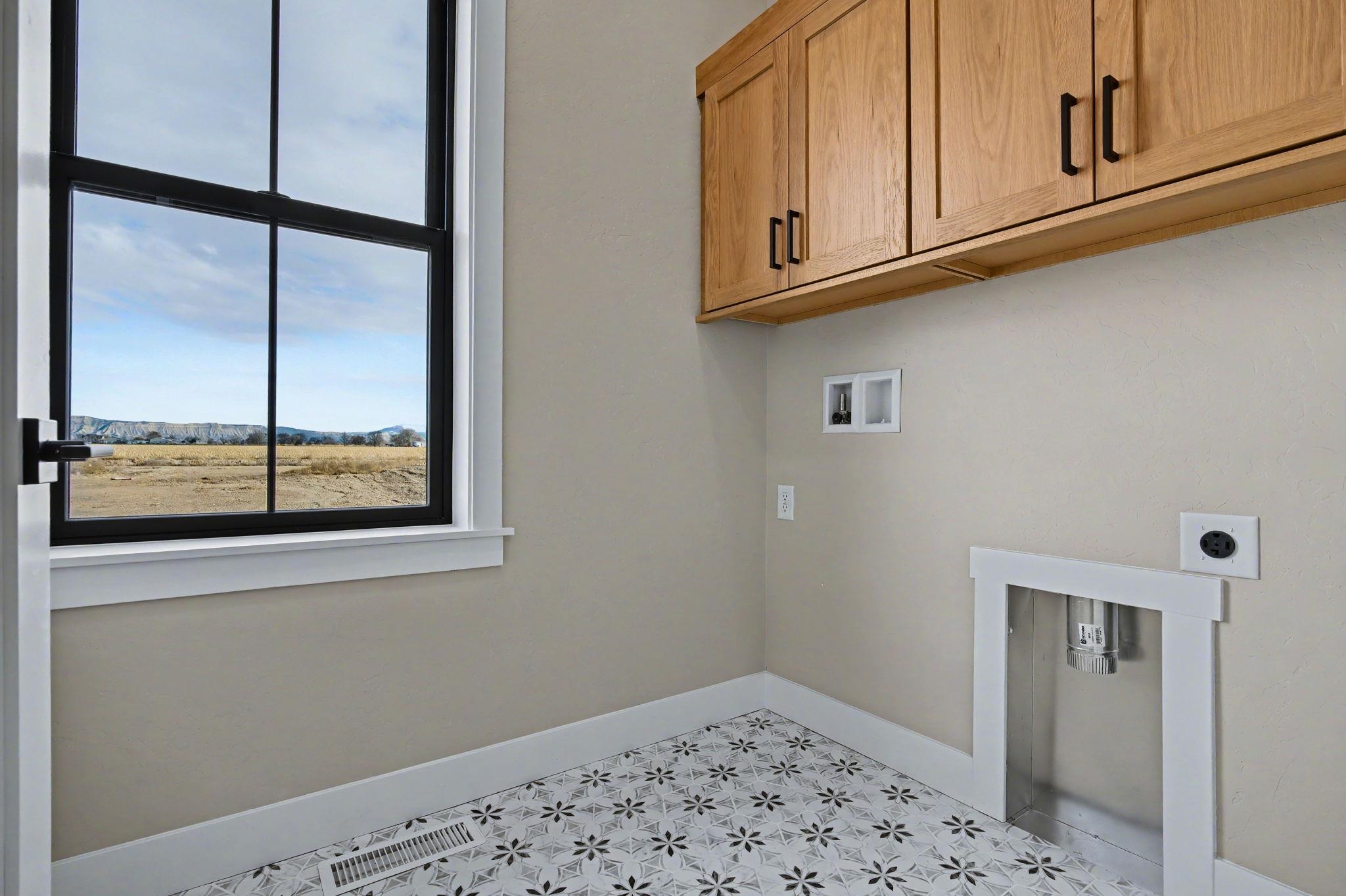 1924 K Road Fruita, CO 81521 - Photo 32 of 40 a view of a closet area with wooden floor