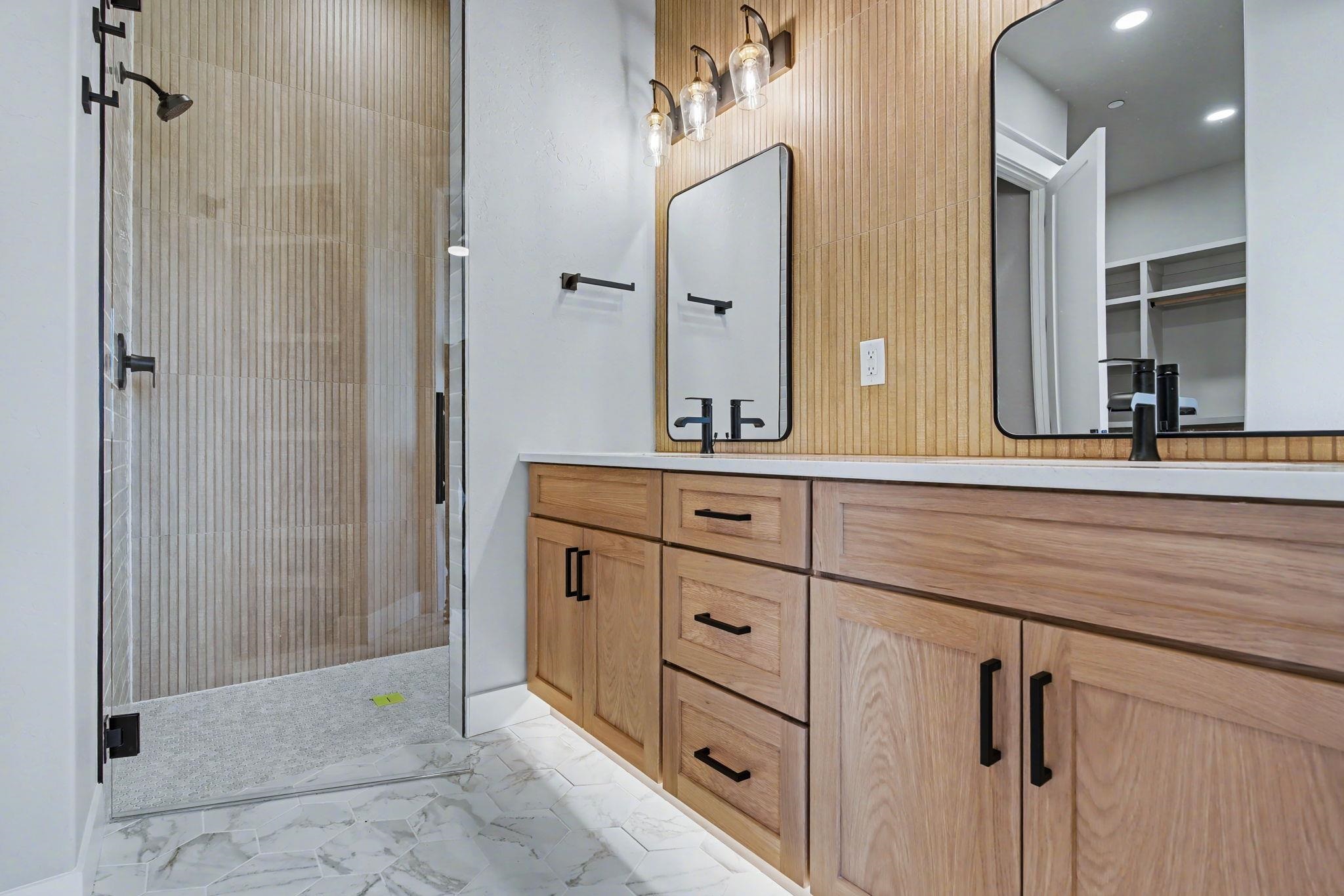 1924 K Road Fruita, CO 81521 - Photo 37 of 40 a bathroom with a shower sink and mirror