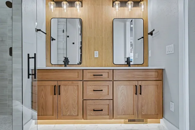 an entryway with a mirror