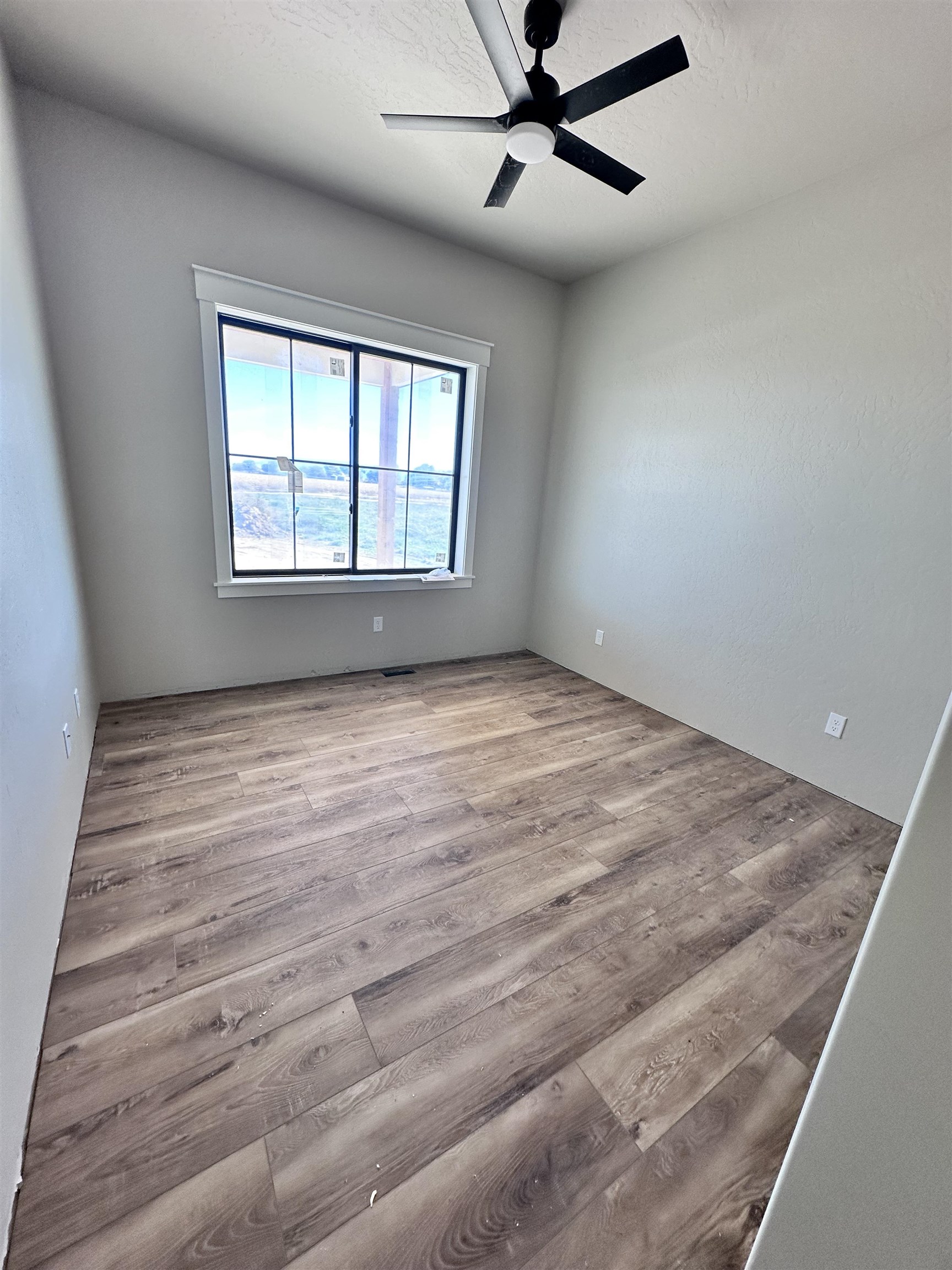 1924 K Road Fruita, CO 81521 - Photo 10 of 13 a view of an empty room with a window