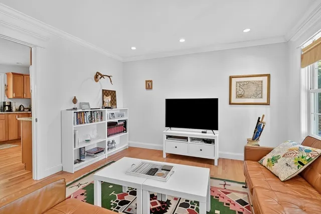 a house view with a sitting space and garden