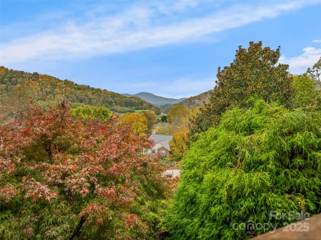 a view of mountains and valleys