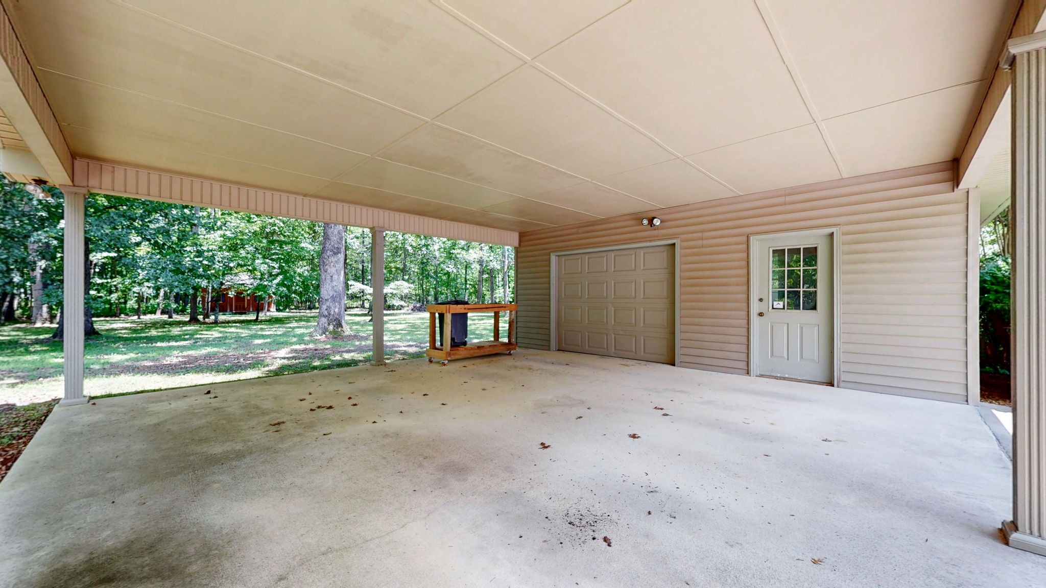 830 Motlow College Road Normandy, TN 37360 - Photo 18 of 70 a view of a house with backyard and floor to ceiling window
