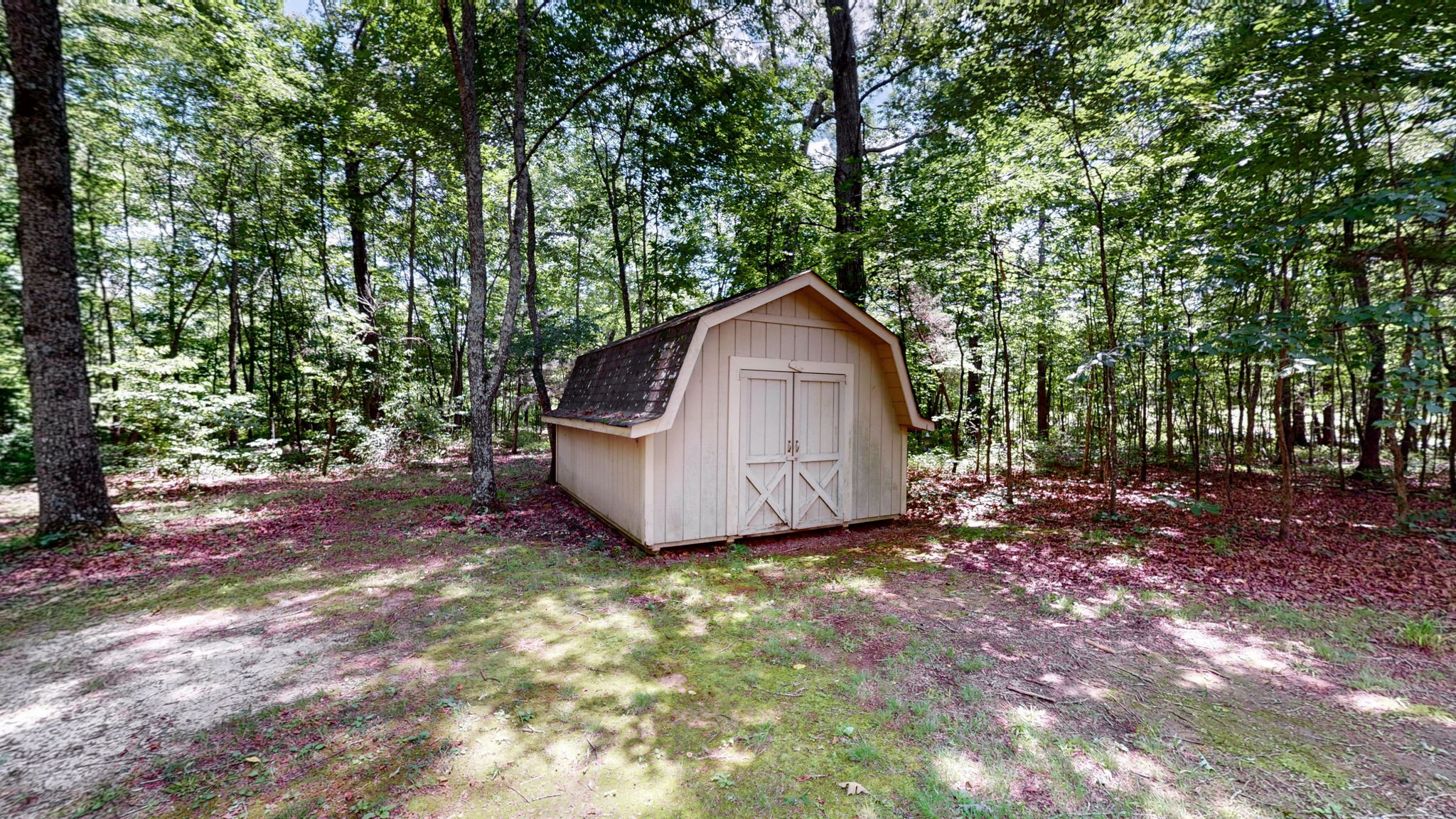 830 Motlow College Road Normandy, TN 37360 - Photo 22 of 70 a view of a small house with a yard