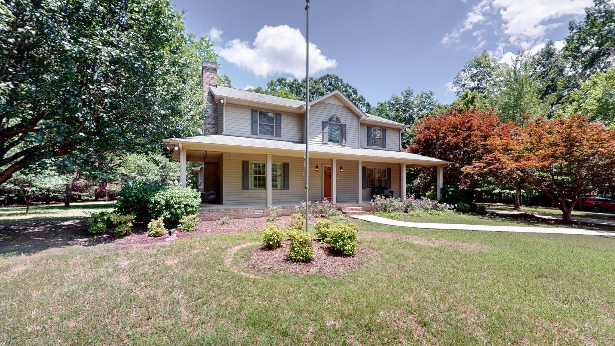 830 Motlow College Road Normandy, TN 37360 - Photo 3 of 70 a front view of a house with a yard table and chairs