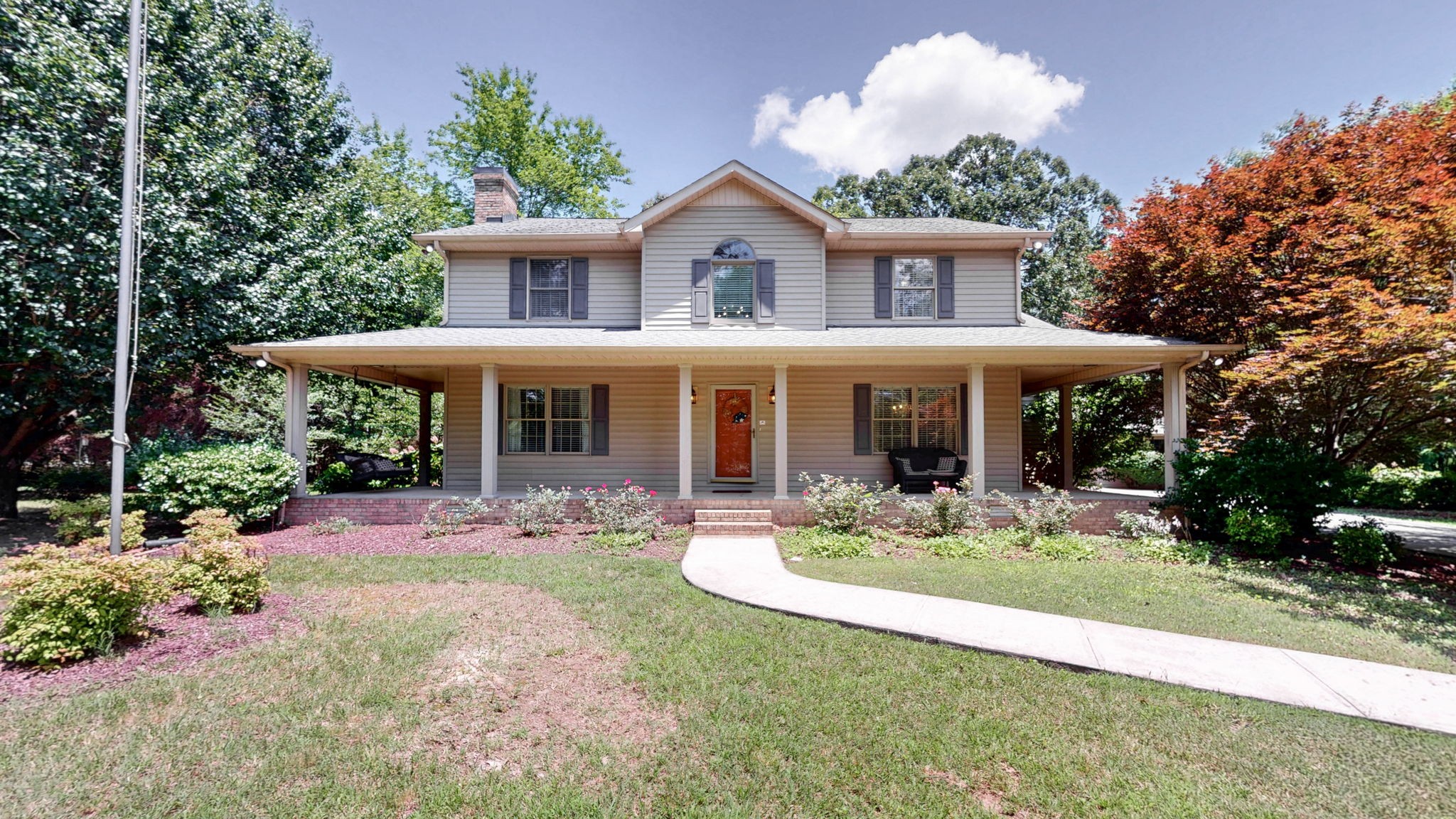 830 Motlow College Road Normandy, TN 37360 - Photo 7 of 70 a front view of a house with garden and porch