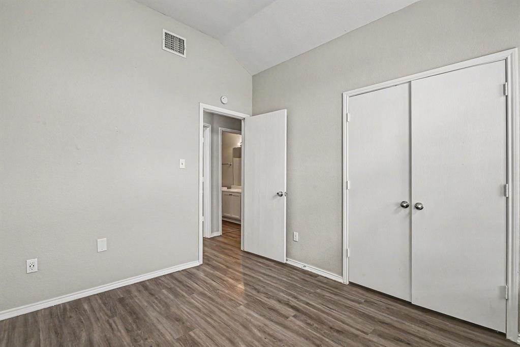 138 Kings Way Drive Rhome, TX 76078 - Photo 13 of 16 a view of an empty room and wooden floor