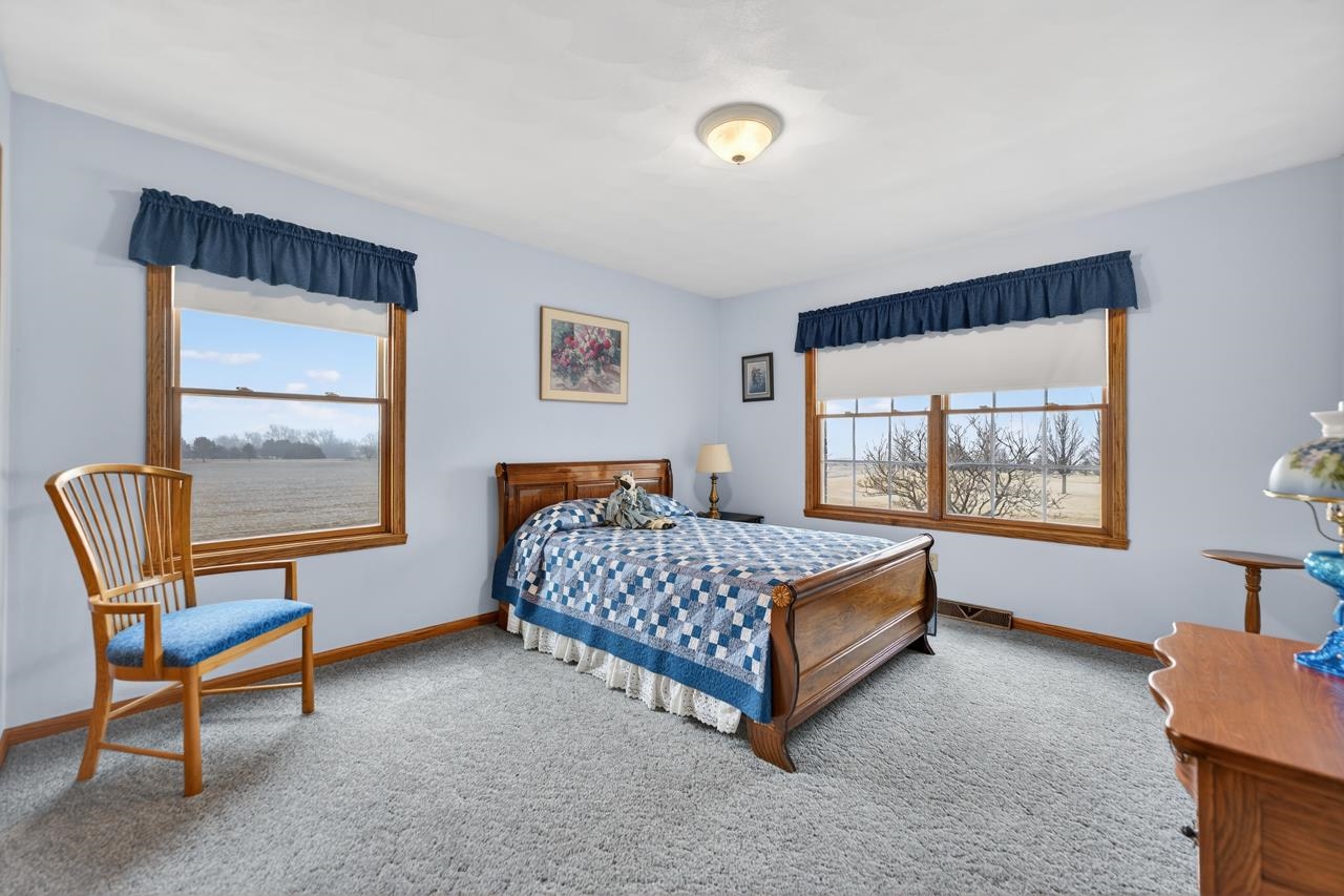 10023 Auburn Road Winnebago, IL 61088 - Photo 14 of 59 a bedroom with a bed and window