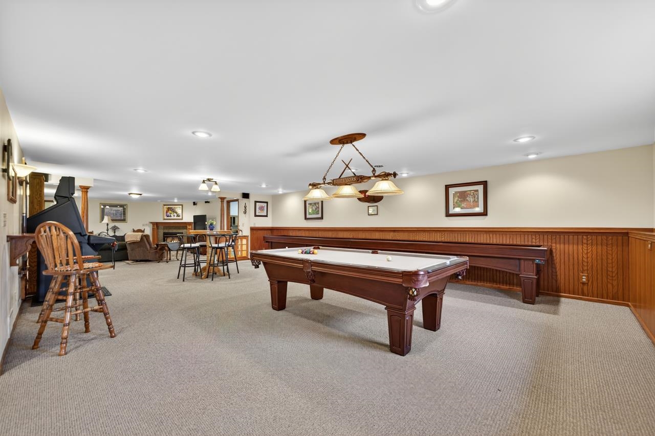 10023 Auburn Road Winnebago, IL 61088 - Photo 21 of 59 a living room with furniture and pool table