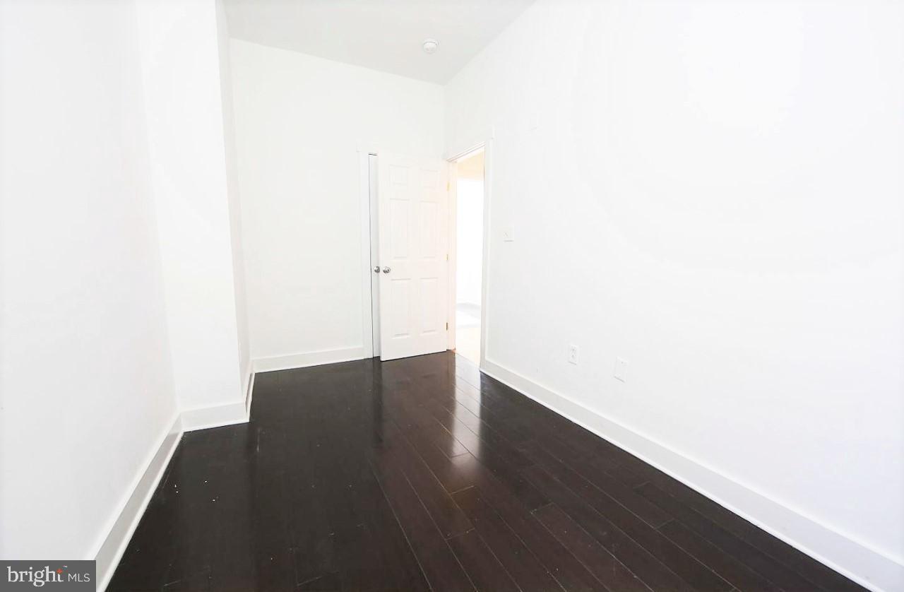 2018 North 18th Street, Unit B Philadelphia, PA 19121 - Photo 13 of 16 a view of a room with wooden floor