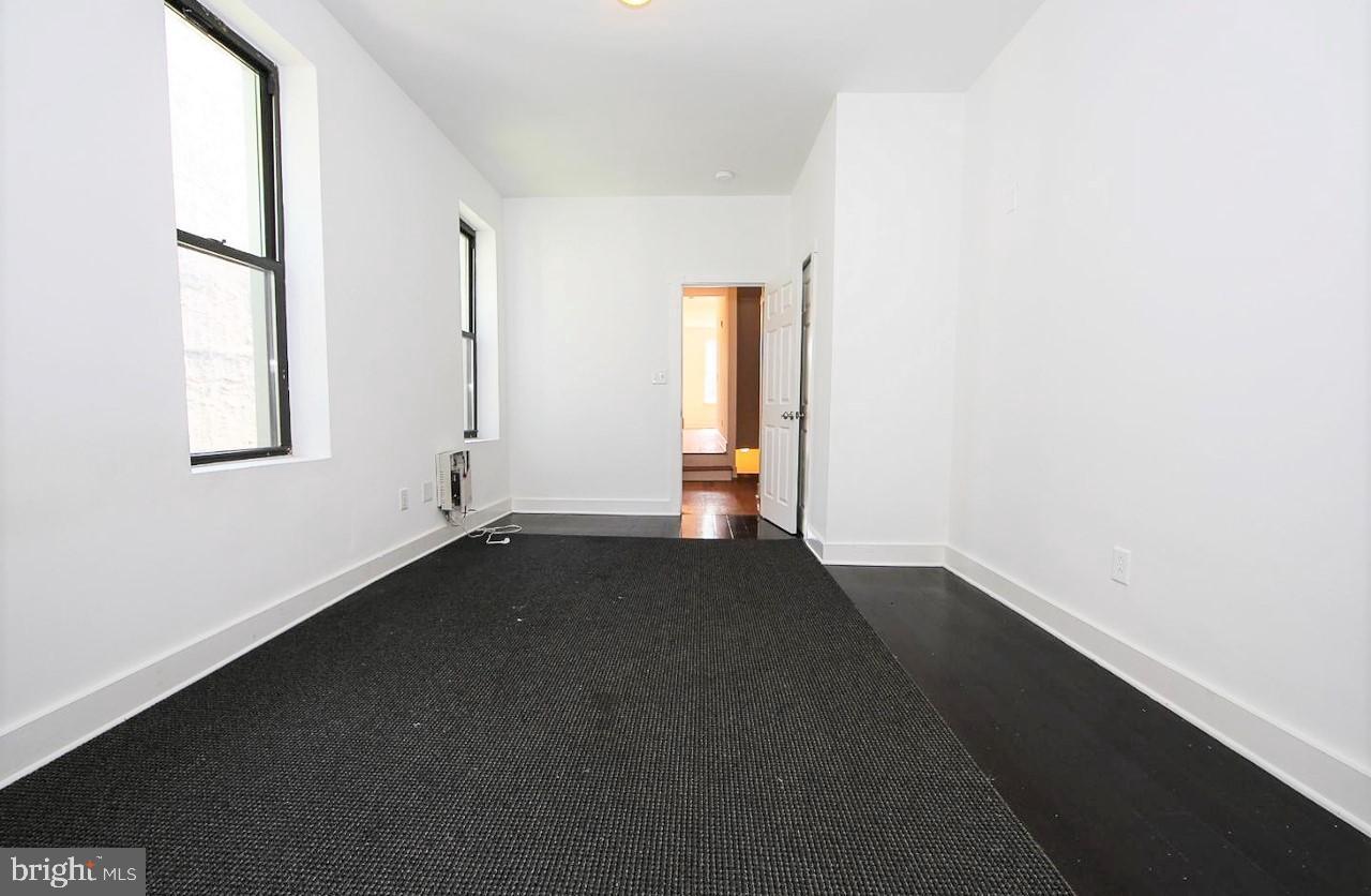 2018 North 18th Street, Unit B Philadelphia, PA 19121 - Photo 9 of 16 an empty room with a window