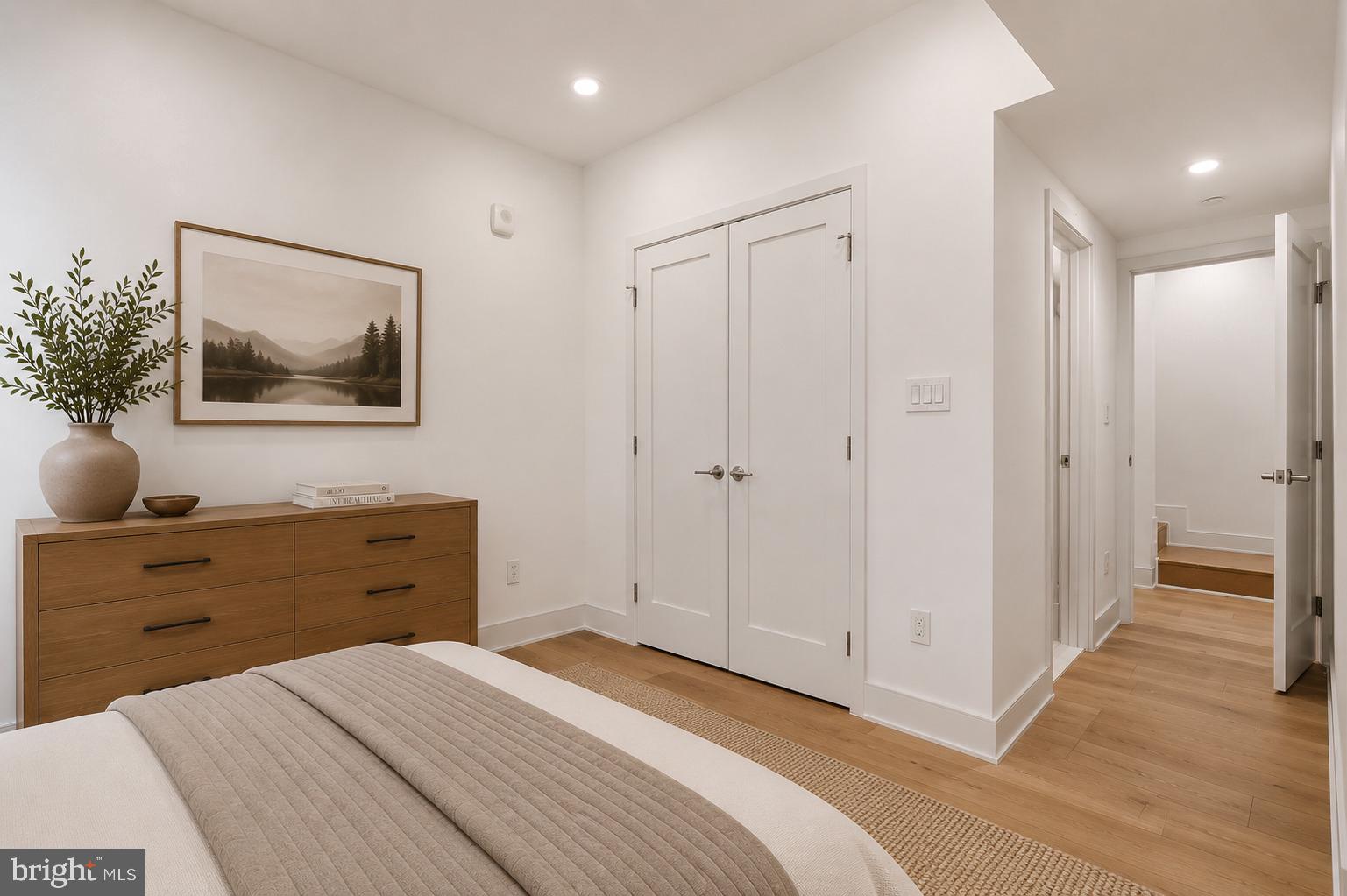1810 Central Place Northeast, Unit 1 Washington, DC 20002 - Photo 22 of 36 a bedroom with a bed and a cabinet