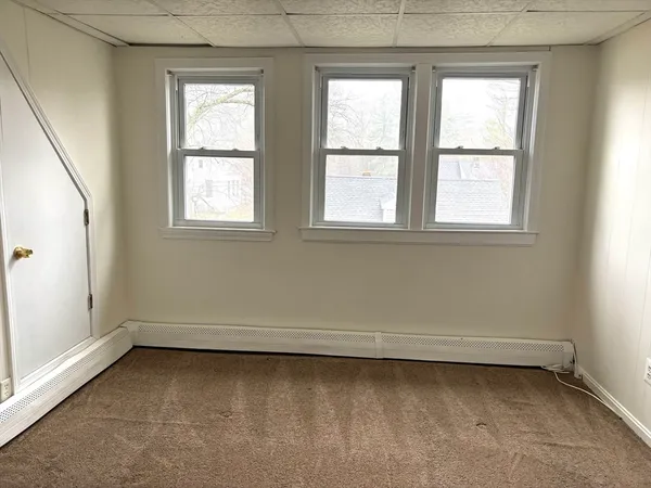 an empty room with a window