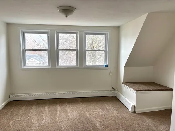 an empty room with windows