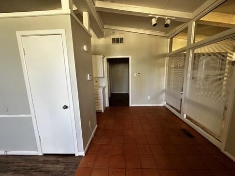 2003 32nd Street, Unit A Lubbock, TX 79411 - Photo 10 of 22 a view of a hallway with wooden floor and staircase