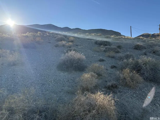 a view of a house with a mountain